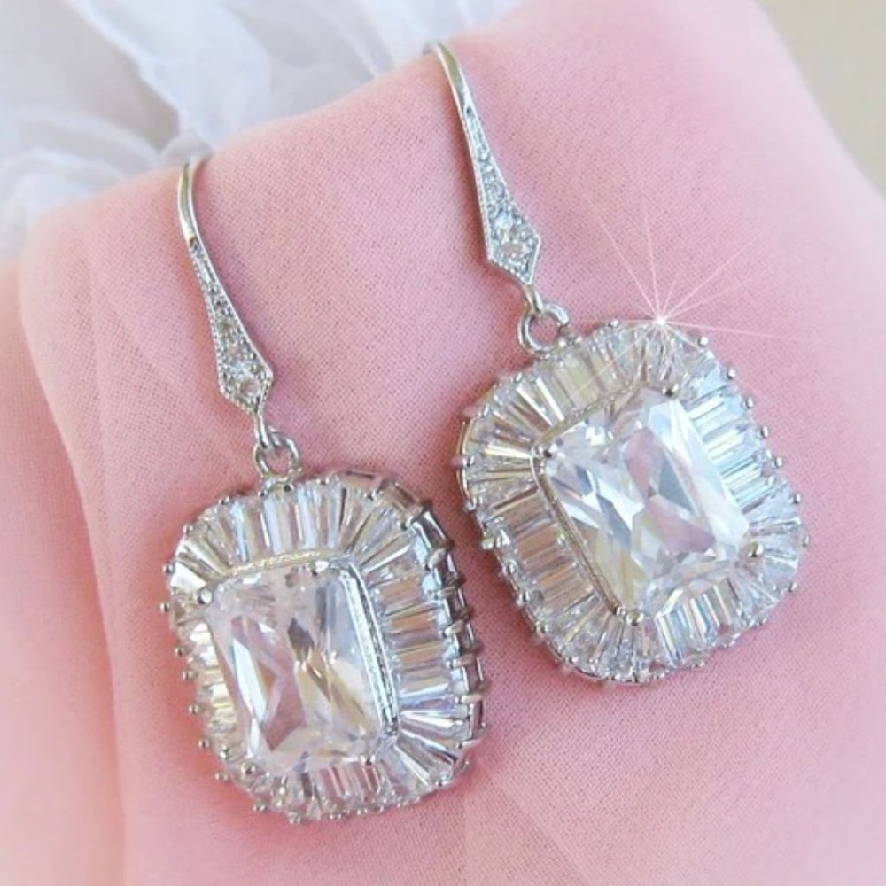 Emerald Cut CZ Diamond Glam Earrings With Baguette Halo